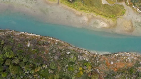 Drone view of glacial forest and a blue river in Tierra del Fuego, Patagonia Stock Footage 111831210
