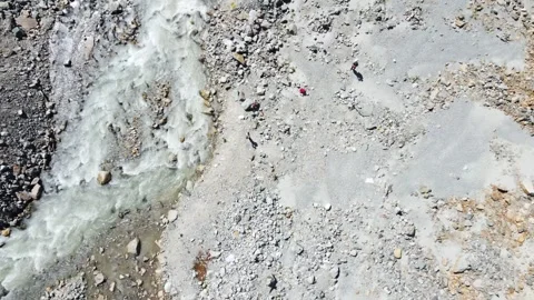 Drone View of Glacial River from Shkhara Glacier in Georgia 4K Stock Footage 312331158