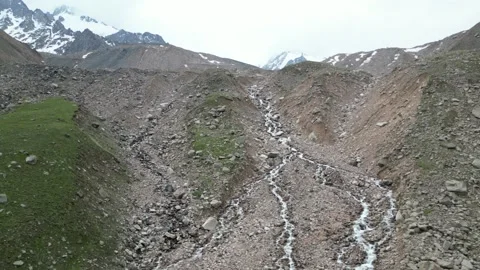 Drone view of glacier-fed mountain stream in Ile-Alatau National Park Stock Footage 340452377