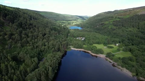 Drone view of Glendalough lakes and forested valley, Wicklow, Ireland Stock Footage 346746164