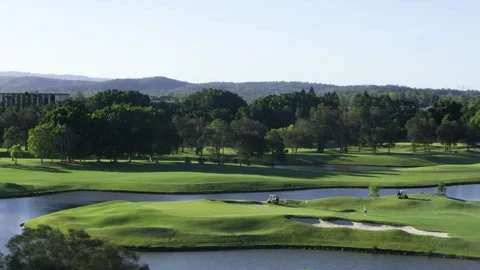 Drone view of a golf course and players Stock Footage 264150654