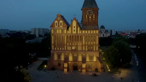 Drone view of the Gothic Cathedral in the evening twilight in Kaliningrad with a 스톡 동영상 223150840