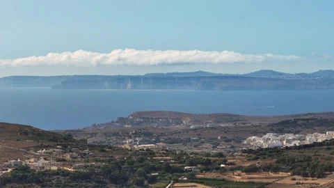 Drone view of Gozo island, cliffs, Malta countryside. Clouds and sky Stock Footage 278870524
