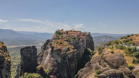 Drone view of Great Meteoron Monastery built on top of massive rock formati.. Fotos de archivo