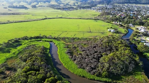 Drone view of green hills, open meadows, and mountains Stock Footage 326972971