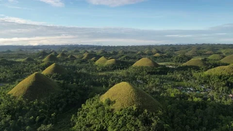 Drone view of green hills in the sun. Aerial view of beautiful summer landscape Stock Footage 232645189