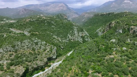 Drone View of Green Mountain Gorge near Kardamyli, Greece Stock Footage 335643640