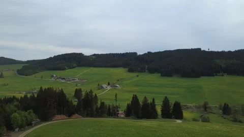Drone view of green spring fields and rural village on a sunny day. Stock Footage 336678267
