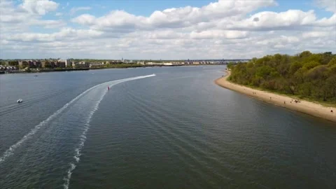 Drone view of green trees coast and Beach Viewing Platform and the sea wit cloud Stock Footage 242181184
