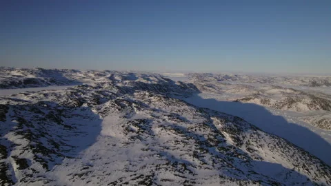 Drone View Of Greenland's Expansive Rugged Snow-Covered Mountains 库存影片 287442945