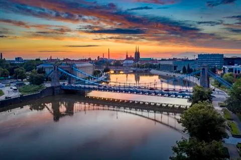 Drone view on the Grunwaldzki Bridge above river in Wrocław at beautiful sunset Stock Photos