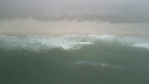 Drone View of Half Moon Bay Beach in Thick Coastal Fog Видео 348412640