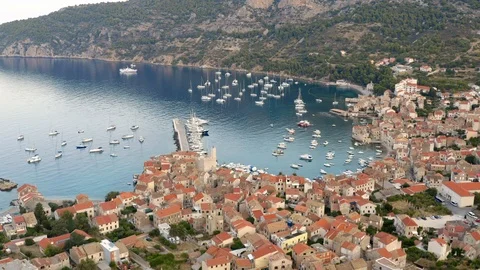 Drone view of harbor in small city in summer with vivid blue sea around. Stock Footage 119868782