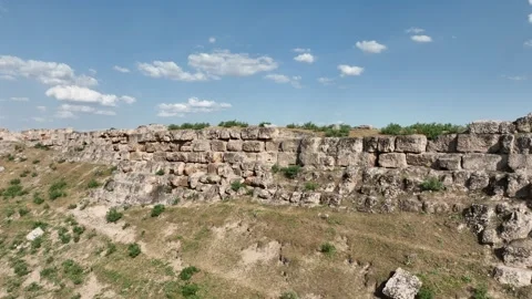 Drone view of Harran castle walls and ancient fortress ruins in Sanliurfa Video stock 324116024