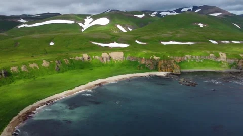 Drone view of the harsh coast of the Commander Islands in the Pacific Ocean. Video stock 323068924