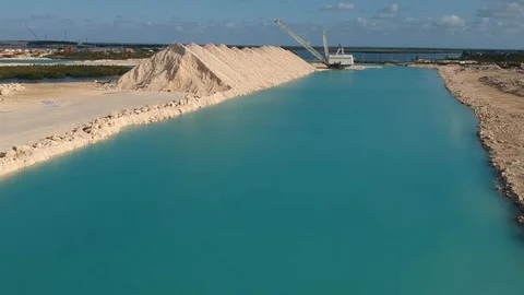 Drone View of Heavy Crane Dredging Machinery at Fishing Hole Road, Bahamas Stock Footage 89655439