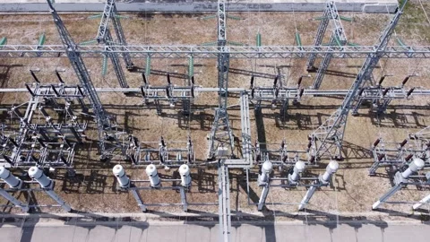 Drone view of high-voltage equipment of a city power plant. Stock Footage 238671696