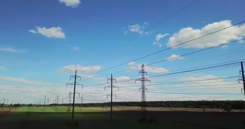 Drone view on high voltage power lines, rural scene Stock Footage 154573050