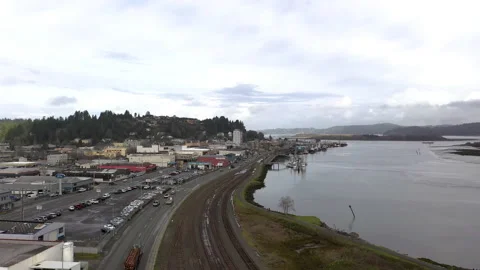 Drone view of Highway 101 and train tracks in Coos Bay, Oregon, USA Stock Footage 149803580