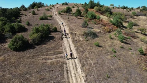 Drone view of hiker walking on a high mountain path Video stock 194019837