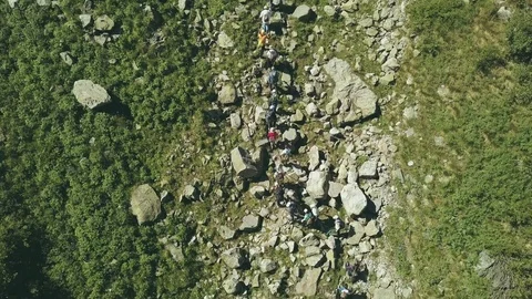 Drone view hiking group walking on mountain valley. Aerial view mountains Stock Footage 81069210