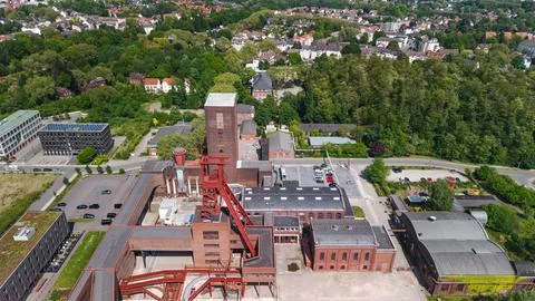 Drone view of historic mining shaft tower and industrial buildings in Essen Stock Photos