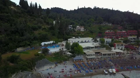 Drone view of hotels and small beach at Liapades bay Corfu Stock Footage 133336313