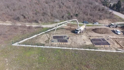 Drone View Of House Foundation Construction With Concrete Pouring Process Stock Footage 330131835