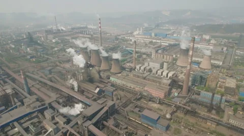 Drone view huge industrial complex, steel factory coal fired power plants China Stock Footage