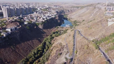 Drone view of a hydroelectric power station in a large canyon 動画素材 317951060