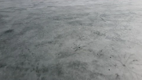 Drone view on ice on the lake or river. Cracking and melting ice on water. Stock Footage 160542206