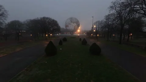 A drone view of the iconic Unisphere in Flushing Meadows Corona Park on a foggy Stock Footage 333341944
