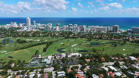 Drone view of impressive La Gorce Club surrounded with rich housing estates and Stock Footage 255800098