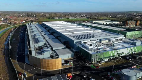 Drone view of industrial HVAC units and cooling infrastructure at a UK data Stock Footage 335024032