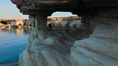 Drone view from inside a sea cave tunnel at Cape Cavo Greco, Cyprus. Stock Footage 341540815