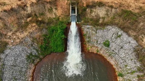 Drone view of irrigation water cascading into a pond. Stock Footage 331279711