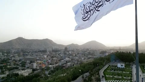 Drone View of Kabul City Featuring Wazir Akbar Khan Hill and White Flag Stock Footage 296765436