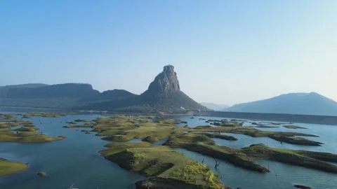 Drone view of Karamchat Dam, capturing the tranquil surroundings and the Stock Footage 299240351