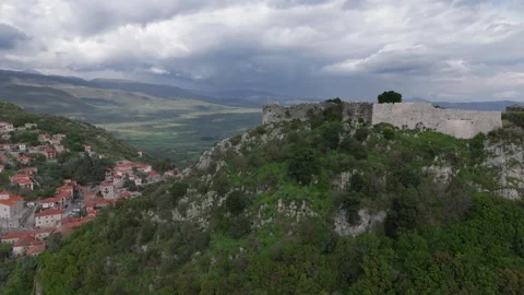 Drone View of Karytaina Castle Above Mountain Village Stock Footage 337031252