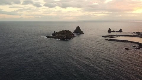 Drone view Lachea Island of Acitrezza bay at sunset in Sicily Italy Stock Footage 146800683