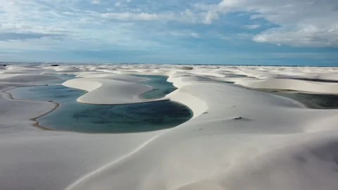 Drone View Of Lagoon Between White Sand Dunes In Maranhao Stock Footage 327625474