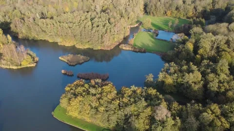 Drone View of Lake with Small Forest Islands Stock Footage 321638620