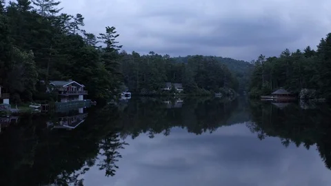 Drone view of lakeside homes in the evening. Stock Footage 113984850