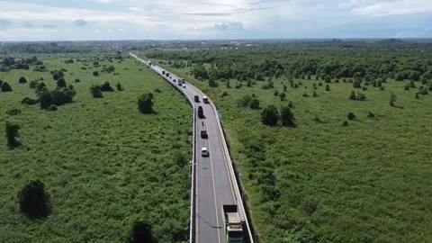 DRONE VIEW LALIN JALAN BARU PROVINSI BENGKULU SLIDE LEFT Stock Footage 201066037