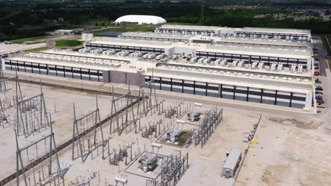 Drone View of Large Artificial Intelligence Data Center Facility and Electrical Stock Footage 346197826