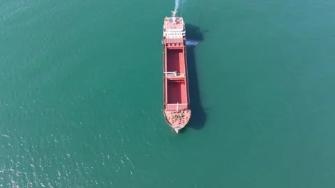 Drone View Of Large Cargo Vessel Crossing Open Blue Ocean Видео 331234694