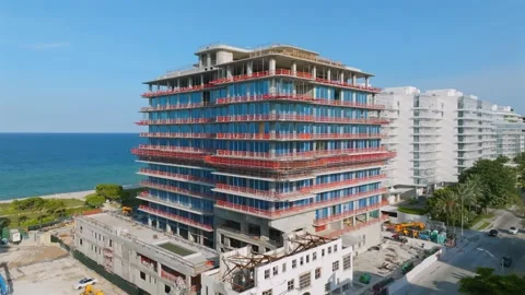 Drone view of large construction site for one more new hotel complex with large Stock Footage 245955364