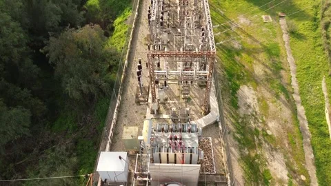 Drone view of a large electrical substation in a countryside landscape Stock Footage 303009876