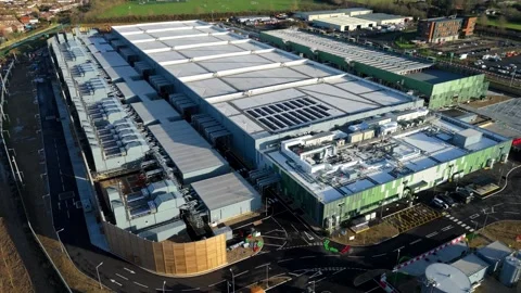 Drone view of a large-scale colocation data center and tech infrastructure in Stock Footage 335226121