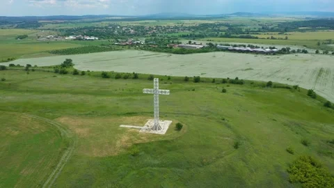 Drone view. A large sculptural structure of a Christian cross in the Balkans Stock Footage 232843109